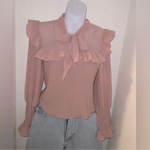 Pink bow tied blouse